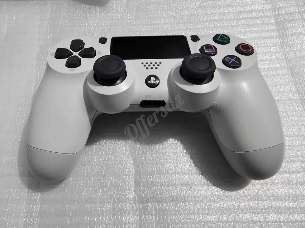 Manette ps4 v2 original en très bon état